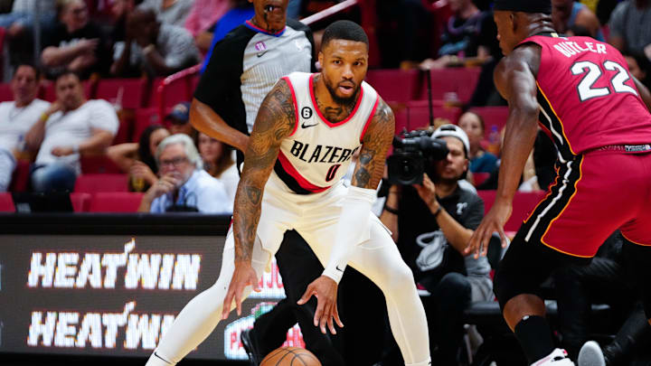 Portland Trail Blazers guard Damian Lillard (0) dribbles the ball.