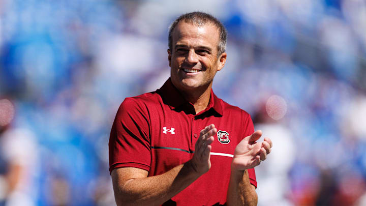 Sep 7, 2024; Lexington, Kentucky, USA; South Carolina Gamecocks head coach Shane Beamer claps during warm-ups before the game against the Kentucky Wildcats at Kroger Field. Mandatory Credit: Jordan Prather-Imagn Images