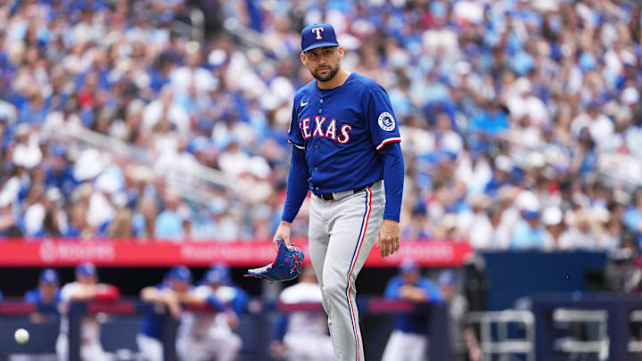 Aug 17, 2025; Toronto, Ontario, CAN; Texas Rangers starting pitcher Nathan Eovaldi (17) walks towards the dugout against the Toronto Blue Jays during the fifth inning at Rogers Centre. Mandatory Credit: Nick Turchiaro-Imagn Images