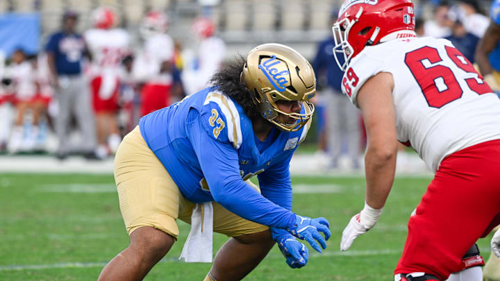 Nov 30, 2024; Pasadena, California, USA; UCLA Bruins defensive lineman Jay Toia (93) against the Fresno State Bulldogs at Rose Bowl. Mandatory Credit: Robert Hanashiro-Imagn Images