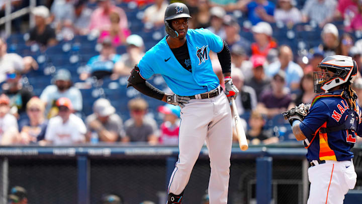 Mar 21, 2023; West Palm Beach, Florida, USA; Miami Marlins center fielder Jesus Sanchez (7) stretches at the plate during a game against the Houston Astros at The Ballpark of the Palm Beaches. Mar 21, 2023; West Palm Beach, Florida, USA; Miami Marlins center fielder Jesus Sanchez (7) stretches at the plate during a game against the Houston Astros at The Ballpark of the Palm Beaches.