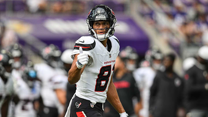 Aug 9, 2025; Minneapolis, Minnesota, USA; Houston Texans wide receiver Jayden Higgins (81) warms up before the game against the Minnesota Vikings at U.S. Bank Stadium. Mandatory Credit: Jeffrey Becker-Imagn Images