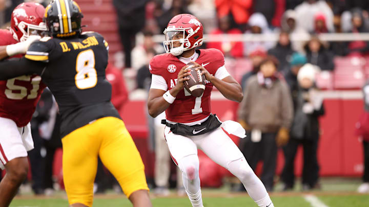 Nov 29, 2025; Fayetteville, Arkansas, USA; Arkansas Razorbacks quarterback KJ Jackson (7) drops back to pass in the first quarter against the Missouri Tigers at Donald W. Reynolds Razorback Stadium. Mandatory Credit: Nelson Chenault-Imagn Images