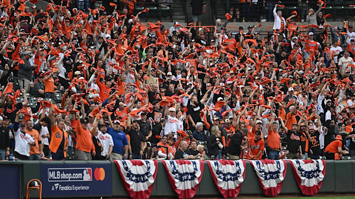 Baltimore Orioles fans wave rally towels before game two of the Wild Card round for the 2024 MLB Playoffs against the Kansas City Royals at Oriole Park at Camden Yards on Oct 2.