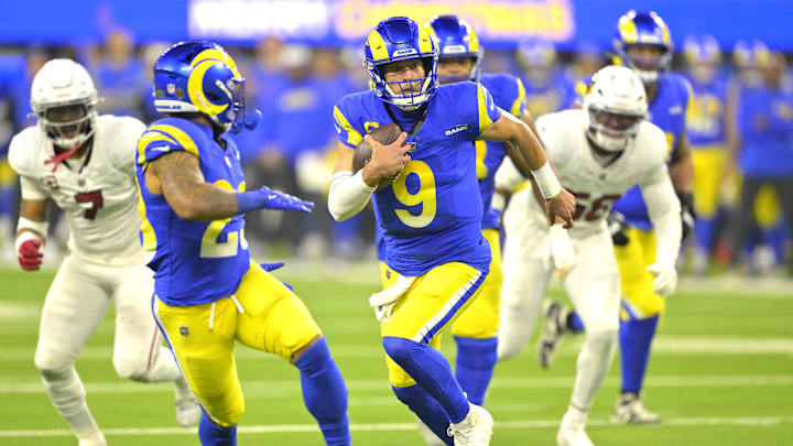 Dec 28, 2024; Inglewood, California, USA;   Los Angeles Rams quarterback Matthew Stafford (9) carries the ball to the 5-yard line in the first half against the Arizona Cardinals at SoFi Stadium. Mandatory Credit: Jayne Kamin-Oncea-Imagn Images
