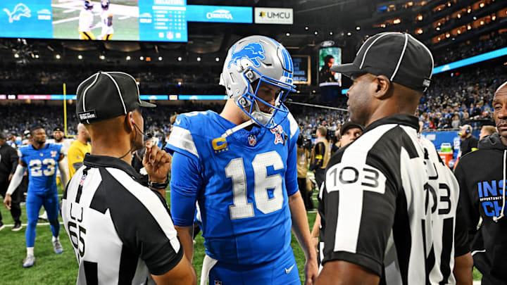 Detroit Lions quarterback Jared Goff (16) speaks with officials after the game at Ford Field.