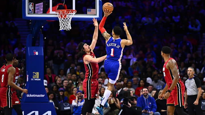 Feb 14, 2024; Philadelphia, Pennsylvania, USA; Philadelphia 76ers forward Kenyon Martin Jr (1) shoots against Miami Heat guard Jaime Jaquez Jr (11) in the second quarter at Wells Fargo Center. Mandatory Credit: Kyle Ross-Imagn Images Feb 14, 2024; Philadelphia, Pennsylvania, USA; Philadelphia 76ers forward Kenyon Martin Jr (1) shoots against Miami Heat guard Jaime Jaquez Jr (11) in the second quarter at Wells Fargo Center. Mandatory Credit: Kyle Ross-Imagn Images