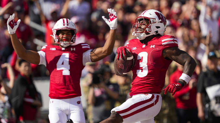 Oct 5, 2024; Madison, Wisconsin, USA;  Wisconsin Badgers running back Tawee Walker (3) celebrates after scoring a touchdown during the third quarter against the Purdue Boilermakers at Camp Randall Stadium. Mandatory Credit: Jeff Hanisch-Imagn Images