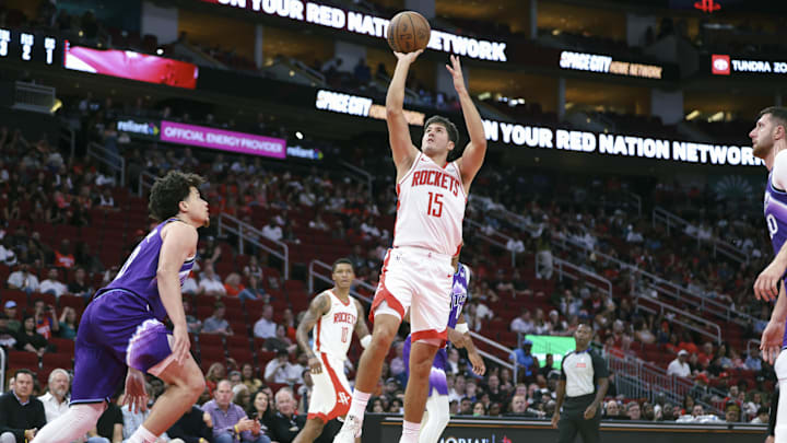 Oct 8, 2025; Houston, Texas, USA; Houston Rockets guard Reed Sheppard (15) shoots the ball during the third quarter against the Utah Jazz at Toyota Center. Mandatory Credit: Troy Taormina-Imagn Images