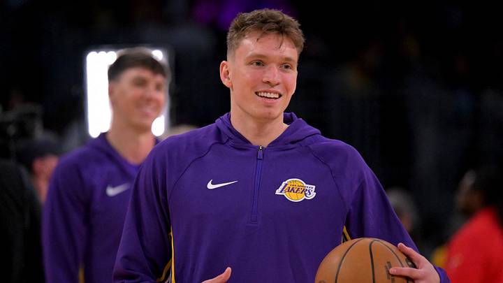 Oct 12, 2025; Los Angeles, California, USA;  Los Angeles Lakers forward Dalton Knecht (4) warms up prior to the game against the Golden State Warriors at Crypto.com Arena. Mandatory Credit: Jayne Kamin-Oncea-Imagn Images