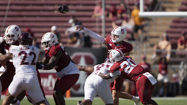 Oct 5, 2024; Stanford, California, USA;  Stanford Cardinal quarterback Justin Lamson (8) throws the football against the Virginia Tech Hokies during the third quarter at Stanford Stadium. 