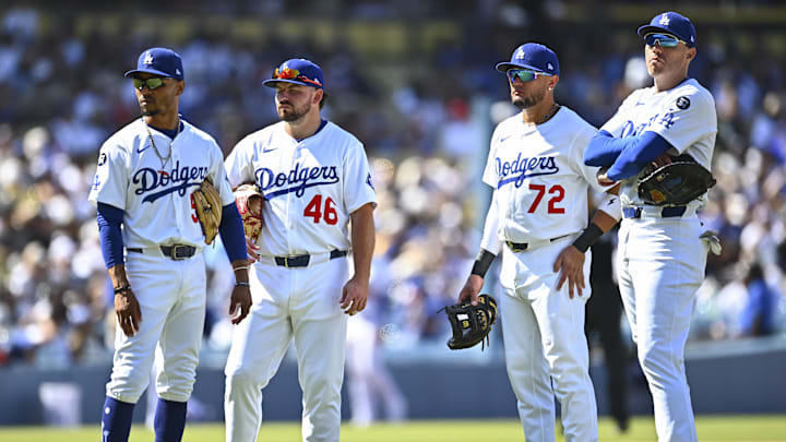 Aug 17, 2025; Los Angeles, California, USA; Los Angeles Dodgers shortstop Mookie Betts (50), third baseman Buddy Kennedy (46), second base Miguel Rojas (72), and first baseman Freddie Freeman (5) on the field against the San Diego Padres during the eighth inning at Dodger Stadium. Mandatory Credit: Jonathan Hui-Imagn Images Aug 17, 2025; Los Angeles, California, USA; Los Angeles Dodgers shortstop Mookie Betts (50), third baseman Buddy Kennedy (46), second base Miguel Rojas (72), and first baseman Freddie Freeman (5) on the field against the San Diego Padres during the eighth inning at Dodger Stadium. Mandatory Credit: Jonathan Hui-Imagn Images