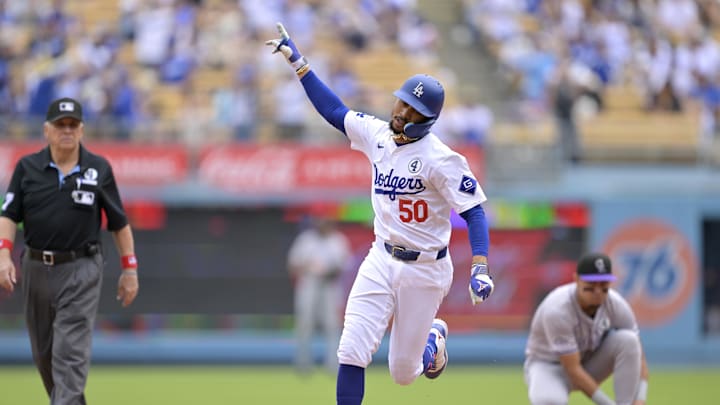 Jun 2, 2024; Los Angeles, California, USA;  Los Angeles Dodgers shortstop Mookie Betts (50) rounds the bases after hitting a solo home run in the first inning against the Colorado Rockies at Dodger Stadium. Mandatory Credit: Jayne Kamin-Oncea-USA TODAY Sports