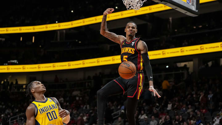 Jan 12, 2024; Atlanta, Georgia, USA; Atlanta Hawks guard Dejounte Murray (5) dunks the ball against