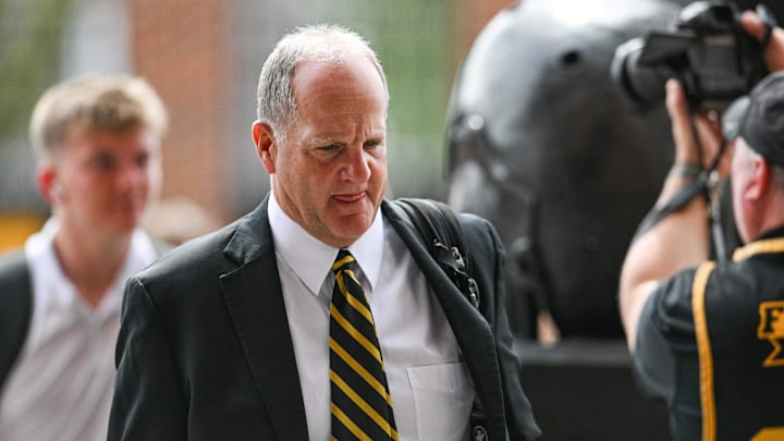 Sep 14, 2024; Iowa City, Iowa, USA; Iowa Hawkeyes defensive coordinator Phil Parker enters Kinnick Stadium before a game against the Troy Trojans. Mandatory Credit: Jeffrey Becker-Imagn Images