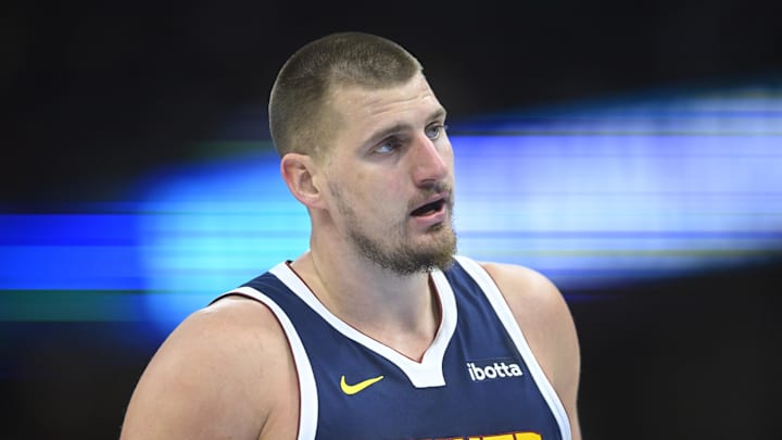 Dec 5, 2024; Cleveland, Ohio, USA; Denver Nuggets center Nikola Jokic (15) stands on the court in the second quarter against the Cleveland Cavaliers at Rocket Mortgage FieldHouse. Mandatory Credit: David Richard-Imagn Images