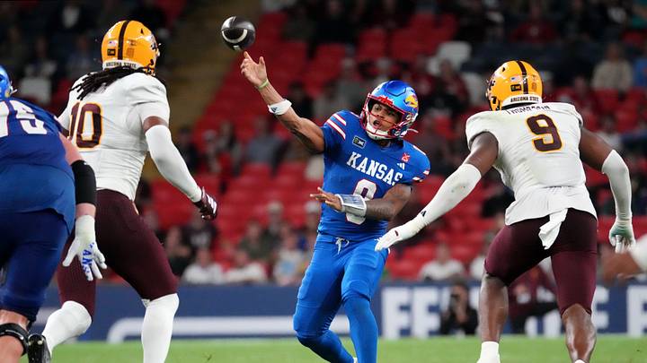 Sep 19, 2026; London, ENG; Kansas Jayhawks quarterback Isaiah Marshall (8) passes the ball against the Arizona State Sun Devils during the second half at Wembley Stadium. Mandatory Credit: Peter van den Berg-Imagn Images Sep 19, 2026; London, ENG; Kansas Jayhawks quarterback Isaiah Marshall (8) passes the ball against the Arizona State Sun Devils during the second half at Wembley Stadium. Mandatory Credit: Peter van den Berg-Imagn Images