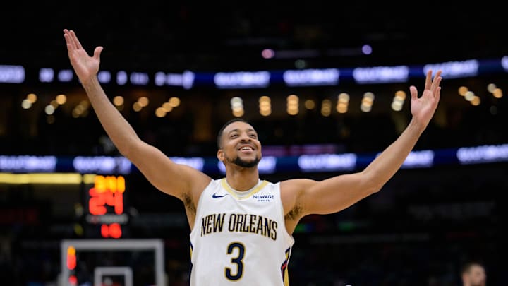 Mar 11, 2025; New Orleans, Louisiana, USA; New Orleans Pelicans guard CJ McCollum (3) reacts after a three-point basket against the Los Angeles Clippers during the fourth quarter at Smoothie King Center. Mandatory Credit: Matthew Hinton-Imagn Images