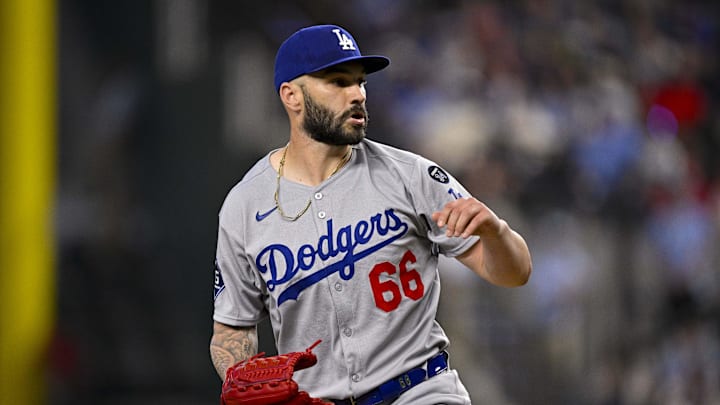 Apr 20, 2025; Arlington, Texas, USA; Los Angeles Dodgers relief pitcher Tanner Scott (66) pitches during the game between the Texas Rangers and the Los Angeles Dodgers at Globe Life Field. Mandatory Credit: Jerome Miron-Imagn Images