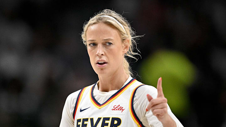 Aug 1, 2025; Dallas, Texas, USA;  Indiana Fever guard Sophie Cunningham (8) points to her teammates during the first half against the Dallas Wings at the American Airlines Center. Mandatory Credit: Jerome Miron-Imagn Images