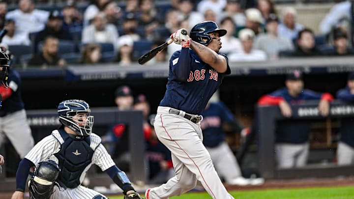 iJun 9, 2023; Bronx, New York, USA; Boston Red Sox third baseman Rafael Devers (11) hits a double