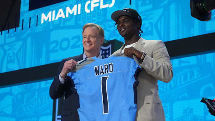 Apr 24, 2025; Green Bay, WI, USA; NFL commissioner Roger Goodell stands with Miami Hurricanes quarterback Cameron Ward  after he is selected by the Tennessee Titans as the number one pick in the first round of the 2025 NFL Draft at Lambeau Field. Mandatory Credit: Kirby Lee-Imagn Images