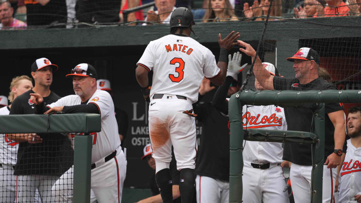 May 27, 2024; Baltimore, Maryland, USA; Baltimore Orioles second baseman Jorge Mateo (center) greeted by manager Brandon Hyde (right) after scoring in the third inning against the Boston Red Sox at Oriole Park at Camden Yards. Mitch Stringer-USA TODAY Sports May 27, 2024; Baltimore, Maryland, USA; Baltimore Orioles second baseman Jorge Mateo (center) greeted by manager Brandon Hyde (right) after scoring in the third inning against the Boston Red Sox at Oriole Park at Camden Yards. Mitch Stringer-USA TODAY Sports
