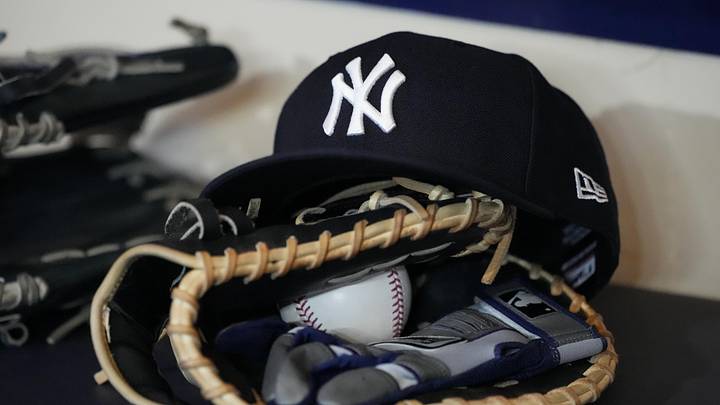 General view of a New York Yankees hat and glove prior to the game against the Milwaukee Brewers at American Family Field.