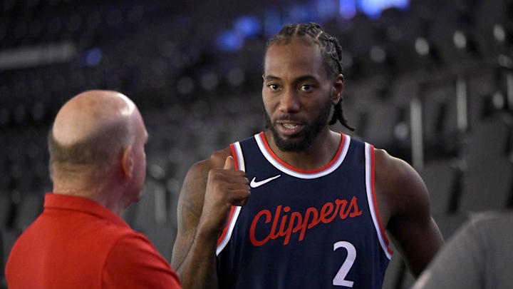 Sep 30, 2024; Inglewood, CA, USA;  Los Angeles Clippers forward Kawhi Leonard (2) talks with team owner Steve Ballmer during media day at Intuit Dome. Mandatory Credit: Jayne Kamin-Oncea-Imagn Images