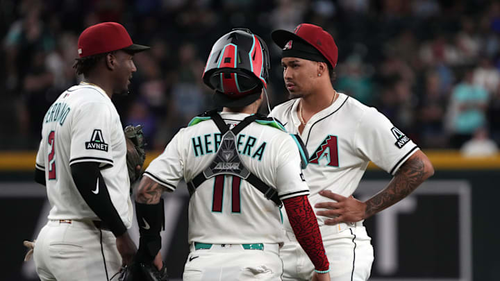 Jun 9, 2025; Phoenix, Arizona, USA; Arizona Diamondbacks pitcher Justin Martinez (63) leaves the game after an injury against the Seattle Mariners in the ninth inning at Chase Field. Mandatory Credit: Rick Scuteri-Imagn Images