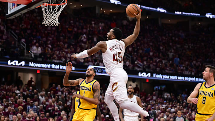 May 4, 2025; Cleveland, Ohio, USA; Cleveland Cavaliers guard Donovan Mitchell (45) dunks during the second half against the Indiana Pacers in game one of the second round for the 2025 NBA Playoffs at Rocket Arena. Mandatory Credit: Ken Blaze-Imagn Images May 4, 2025; Cleveland, Ohio, USA; Cleveland Cavaliers guard Donovan Mitchell (45) dunks during the second half against the Indiana Pacers in game one of the second round for the 2025 NBA Playoffs at Rocket Arena. Mandatory Credit: Ken Blaze-Imagn Images