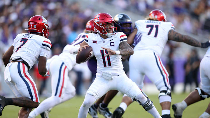 Nov 23, 2024; Fort Worth, Texas, USA;  Arizona Wildcats quarterback Noah Fifita (11) throws a pass against the TCU Horned Frogs in the second half at Amon G. Carter Stadium. Mandatory Credit: Tim Heitman-Imagn Images