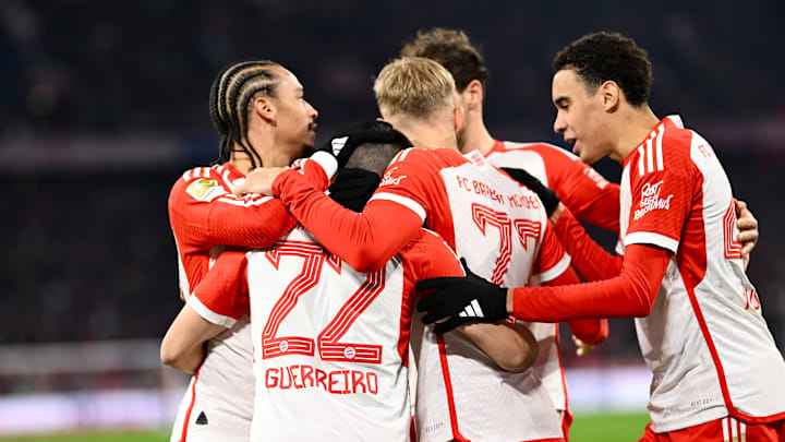 Bayern Munich players celebrating Raphael Guerreiro's goal against Union Berlin.
