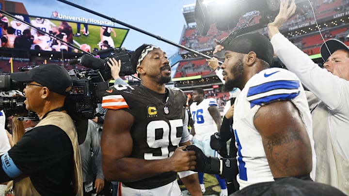 Sep 8, 2024; Cleveland, Ohio, USA; Cleveland Browns defensive end Myles Garrett (95) talks to Dallas Cowboys linebacker Micah Parsons (11) after the game at Huntington Bank Field. Mandatory Credit: Ken Blaze-Imagn Images
