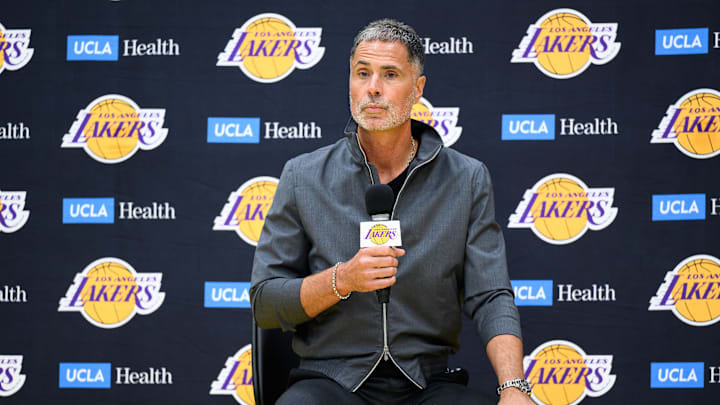 Sep 25, 2025; El Segundo, CA, USA: Los Angeles Lakers general manager Rob Pelinka, left, speaks during a press conference to preview the 2025-26 season at UCLA Health Training Center. Mandatory Credit: William Liang-Imagn Images