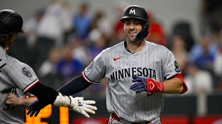 Jun 18, 2026; Arlington, Texas, USA; Minnesota Twins shortstop Ryan Kreidler (5) celebrates after he hits a two-run home run against the Texas Rangers during the eighth inning at Globe Life Field. Mandatory Credit: Jerome Miron-Imagn Images