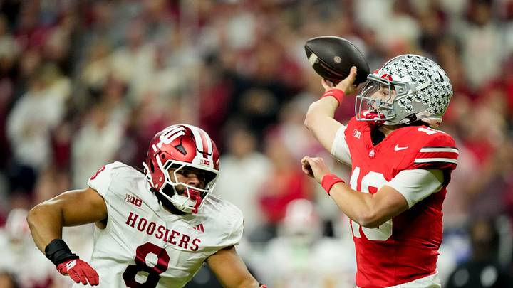 Indiana Hoosiers defensive lineman Stephen Daley (8) moves in on Ohio State Buckeyes quarterback Julian Sayin (10) on Saturday, Dec. 6, 2025, during the Big Ten football championship at Lucas Oil Stadium in Indianapolis.