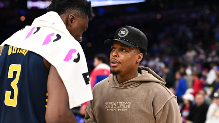 Kyle Lowry talks to the Pacers' Thomas Bryant.