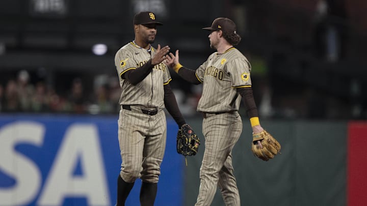 Sep 13, 2024; San Francisco, California, USA; San Diego Padres second base Xander Bogaerts (2) , left , and first base Jake Cronenworth (9) celebrate after defeating the San Francisco Giants at Oracle Park. Mandatory Credit: Stan Szeto-Imagn Images Sep 13, 2024; San Francisco, California, USA; San Diego Padres second base Xander Bogaerts (2) , left , and first base Jake Cronenworth (9) celebrate after defeating the San Francisco Giants at Oracle Park. Mandatory Credit: Stan Szeto-Imagn Images