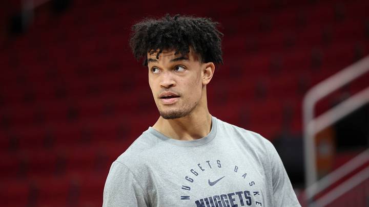 Mar 23, 2025; Houston, Texas, USA; Denver Nuggets forward Spencer Jones (21) looks on during practice before the game against the Houston Rockets at Toyota Center. Mandatory Credit: Troy Taormina-Imagn Images