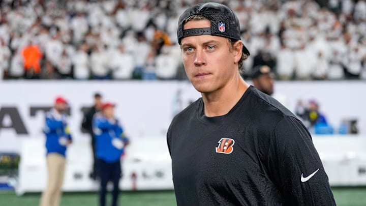 Injured Cincinnati Bengals quarterback Joe Burrow (9) walks on the field after the fourth quarter of the NFL Week 7 game between the Cincinnati Bengals and the Pittsburgh Steelers at Paycor Stadium in downtown Cincinnati on Thursday, Oct. 16, 2025. The Bengals won, 33-31.