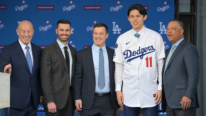 Jan 22, 2025; Los Angeles, CA, USA; L-R; Los Angeles Dodgers President & CEO Stan Kasten, general manager Brandon Gomes, president of baseball operations Andrew Friedman, pitcher Roki Sasaki (11) and manager Dave Roberts during a press conference at Dodger Stadium. Mandatory Credit: Jayne Kamin-Oncea-Imagn Images Jan 22, 2025; Los Angeles, CA, USA; L-R; Los Angeles Dodgers President & CEO Stan Kasten, general manager Brandon Gomes, president of baseball operations Andrew Friedman, pitcher Roki Sasaki (11) and manager Dave Roberts during a press conference at Dodger Stadium. Mandatory Credit: Jayne Kamin-Oncea-Imagn Images
