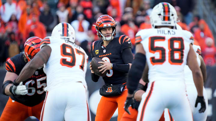 Cincinnati Bengals quarterback Joe Burrow (9) takes a snap before throwing a touchdown pass to Ja'Marr Chase in the fourth quarter of the NFL Week 16 game between the Cincinnati Bengals and the Cleveland Browns at Paycor Stadium in downtown Cincinnati on Sunday, Dec. 22, 2024. The Bengals won 24-16.
