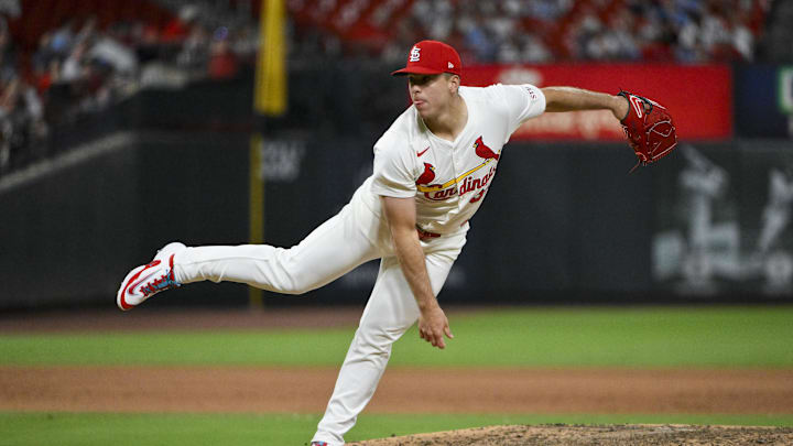 Jun 9, 2025; St. Louis, Missouri, USA;  St. Louis Cardinals relief pitcher Ryan Helsley (56) pitches against the Toronto Blue Jays during the ninth inning at Busch Stadium. Mandatory Credit: Jeff Curry-Imagn Images