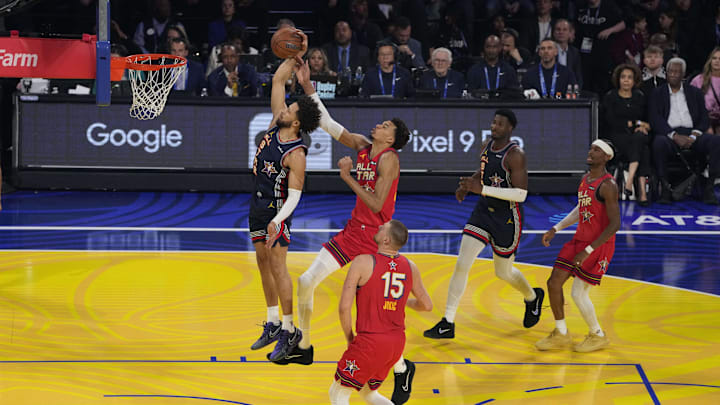 Feb 16, 2025; San Francisco, CA, USA; Kenny’s Young Stars guard Cade Cunningham (2) of the Detroit Pistons shoots against Chuck’s Global Stars forward Victor Wembanyama (1) of the San Antonio Spurs during the 2025 NBA All Star Game at Chase Center. Mandatory Credit: Kyle Terada-Imagn Images