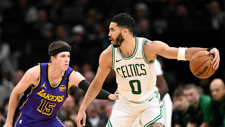 Mar 8, 2025; Boston, Massachusetts, USA; Boston Celtics forward Jayson Tatum (0) dribbles the ball against Los Angeles Lakers guard Austin Reaves (15) during the second quarter at the TD Garden. Mandatory Credit: Brian Fluharty-Imagn Images Mar 8, 2025; Boston, Massachusetts, USA; Boston Celtics forward Jayson Tatum (0) dribbles the ball against Los Angeles Lakers guard Austin Reaves (15) during the second quarter at the TD Garden. Mandatory Credit: Brian Fluharty-Imagn Images