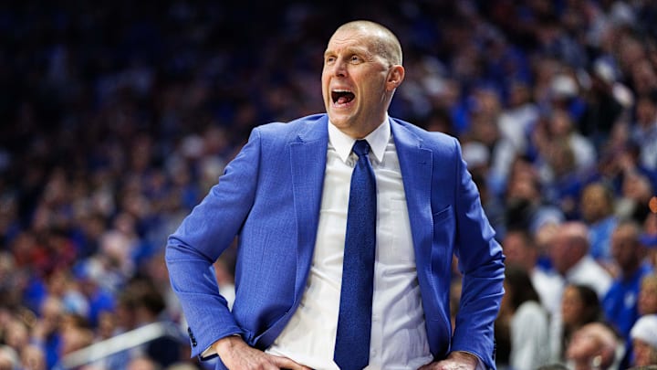 Dec 13, 2025; Lexington, Kentucky, USA; Kentucky Wildcats head coach Mark Pope yells to his players during the first half against the Indiana Hoosiers at Rupp Arena at Central Bank Center. Mandatory Credit: Jordan Prather-Imagn Images