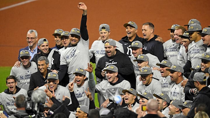 Oct 19, 2024; Cleveland, Ohio, USA; The New York Yankees celebrate after beating the Cleveland Guardians during game five of the ALCS for the 2024 MLB playoffs at Progressive Field.