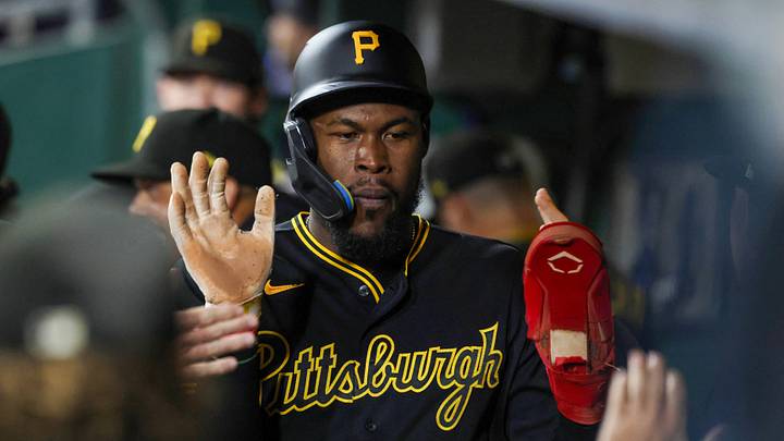 Sep 22, 2026; Pittsburgh, Pennsylvania, USA;  Pittsburgh Pirates center fielder Oneil Cruz (15) high-fives in the dugout after scoring a run against the St. Louis Cardinals during the sixth inning at PNC Park.  Mandatory Credit: Charles LeClaire-Imagn Images