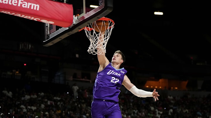 Jul 14, 2025; Las Vegas, NV, USA; Utah Jazz forward Kyle Filipowski (22) dunks the ball against the San Antonio Spurs during the first half of a NBA basketball game at the Thomas & Mack Center. Mandatory Credit: Lucas Peltier-Imagn Images Jul 14, 2025; Las Vegas, NV, USA; Utah Jazz forward Kyle Filipowski (22) dunks the ball against the San Antonio Spurs during the first half of a NBA basketball game at the Thomas & Mack Center. Mandatory Credit: Lucas Peltier-Imagn Images